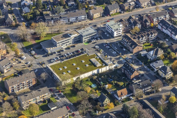 Aerial view, Edeka supermarket, Mozartstraße, Alte Rathausstraße, Andreas-Bräm-Haus, Neukirchener Erziehungsverein, Neukirchen, Neukirchen-Vluyn, Ruhr area, North Rhine-Westphalia, Germany, DE, shopping centre, shopping markets, shopping place, shopping mall, Europe, aerial view, aerial photography, aerial photography, local supply centre, shopping centre, supermarket, overview, bird's eye view, birds-eyes view, overview