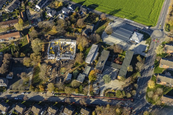 Aerial view, construction site of new double gymnasium, Jahnstraße. Neukirchen, Neukirchen-Vluyn, Ruhr area, North Rhine-Westphalia, Germany, construction work, building, construction area, building site, building plots, construction project, construction site, DE, Europe, aerial view, aerial photography, aerial photography, new building, sports, gymnasium, overview, bird's-eye view, overview