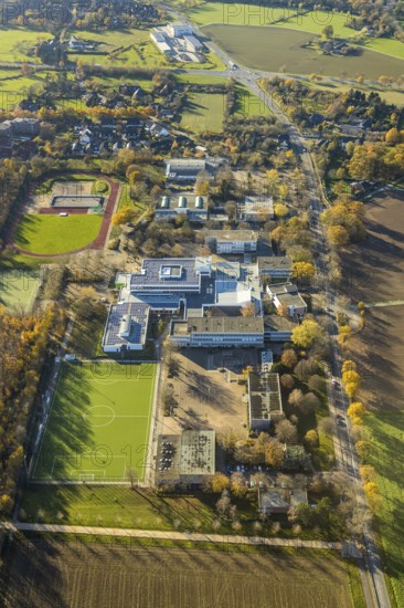 Aerial view, school centre, municipal comprehensive school, Theodor-Heuss-Schule, Haarbeckschule, leisure pool, sports field, Tersteegenstraße, Neukirchen-Vluyn, Lower Rhine, North Rhine-Westphalia, Germany, education, educational institution, DE, Europe, football pitch, football stadium, educational institute, aerial view, aerial photography, aerial photography, photovoltaics, photovoltaic system, Ruhr area, school, solar, solar system, solar energy, solar energy, sport, sports facilities, sports facility, overview, bird's eye view, bird's eye view, overview