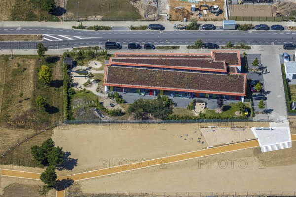 Aerial view, Dicksche Heide development area, KiTa Sternchen Niederberg, Neukirchen-Vluyn, Lower Rhine, North Rhine-Westphalia, Germany, construction area, building site, building plots, construction project, construction site, DE, Europe, property tax, real estate, kindergarten, day nursery, day care centre, day nursery, day care centre, aerial view, aerial photography, aerial photography, new building, overview, bird's-eye view, residential complex, living and living, residential area, residential buildings, residential quality, residential quarter, housing estate, birds-eyes view, overview