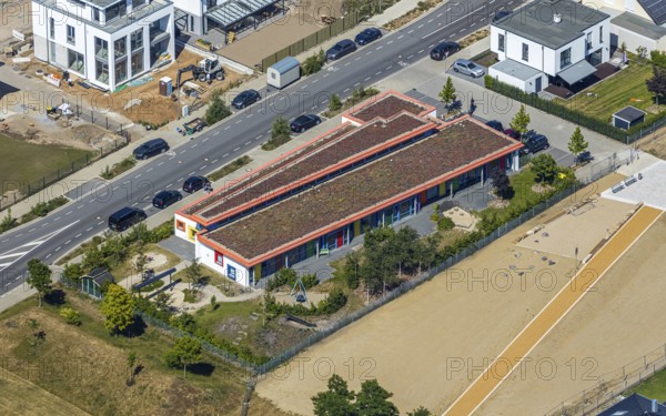 Aerial view, Dicksche Heide development area, KiTa Sternchen Niederberg, Neukirchen-Vluyn, Lower Rhine, North Rhine-Westphalia, Germany, construction area, building site, building plots, construction project, construction site, DE, Europe, property tax, real estate, kindergarten, day nursery, day care centre, day nursery, day care centre, aerial view, aerial photography, aerial photography, new building, overview, bird's-eye view, residential complex, living and living, residential area, residential buildings, residential quality, residential quarter, housing estate, birds-eyes view, overview