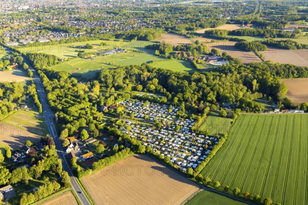 Aerial view, campsite Münster, open-air swimming pool Stapelskotten, Laerer Werseufer, Münster, Münsterland, North Rhine-Westphalia, Germany, camping, camping site, camping buses, camping caravan, campsite, DE, Europe, open-air swimming pool, leisure, leisure facility, leisure activities, aerial photography, aerial photography, overview, bird's eye view, woodland, motorhome, caravan, birds-eyes view, camping, overview