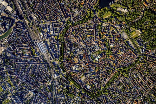 Aerial view, Old Town, Promenadenring, St Paul's Cathedral, Cathedral SquarePaulus-Dom, Domplatz, catholic Liebfrauen-Überwasserkirche, catholic St. Lamberti-Kirche, St. Martini Church, Münster Theatre, Münster Central Station, Münster, Münsterland, North Rhine-Westphalia, Germany, old town area, place of worship, railway tracks, railway station, DE, Deutsche Bahn AG, Europe, religious community, place of worship, property tax, central station, main station, real estate, church, parish, denomination, culture, art, aerial view, aerial photography, aerial photography, religion, theatre, overview, events, bird's-eye view, residential area, living and working, living and life, residential area, residential buildings, housing estate, birds-eyes view, historic city centre, historic city centre, overview
