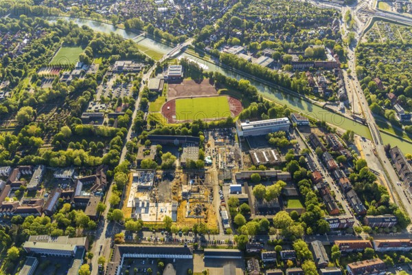 Aerial view, construction site, new Mathilde-Anneke comprehensive school, sports field, sports club Münster 08, Dortmund-Ems canal, Münster, Münsterland, North Rhine-Westphalia, Germany, Albert-Schweitzer-Schule Münster, construction, construction area, building site, building plots, construction project, construction site, education, educational institution, DE, Europe, football pitch, football stadium, football club, comprehensive school, Hans-Böckler-Berufskolleg, canal, educational institute, aerial view, aerial photography, aerial photography, new building, school, sports, sports facilities, sports field, sports facility, overview, bird's-eye view, birds-eyes view, overview