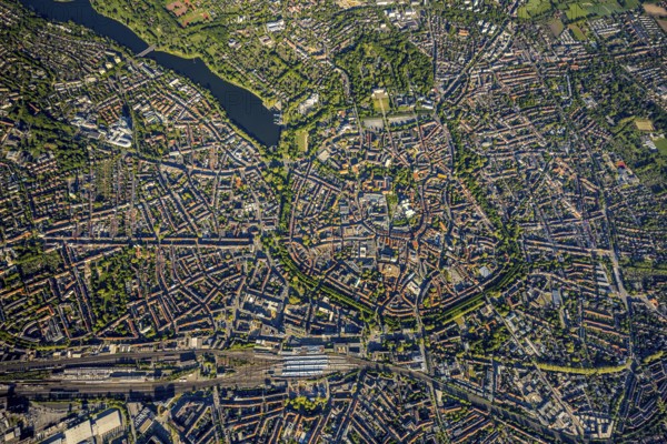 Aerial view, Old Town, Promenadenring, St Paul's Cathedral, Cathedral SquarePaulus-Dom, Domplatz, catholic Liebfrauen-Überwasserkirche, catholic St. Lamberti-Kirche, St. Martini Church, Münster Theatre, Münster Central Station, Münster, Münsterland, North Rhine-Westphalia, Germany, old town area, place of worship, railway tracks, railway station, DE, Deutsche Bahn AG, Europe, religious community, place of worship, property tax, central station, main station, real estate, church, parish, denomination, culture, art, aerial view, aerial photography, aerial photography, religion, theatre, overview, events, bird's-eye view, residential area, living and working, living and life, residential area, residential buildings, housing estate, birds-eyes view, historic city centre, historic city centre, overview