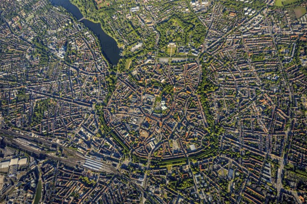 Aerial view, Old Town, Promenadenring, St Paul's Cathedral, Cathedral SquarePaulus-Dom, Domplatz, catholic Liebfrauen-Überwasserkirche, catholic St. Lamberti-Kirche, St. Martini Church, Münster Theatre, Münster Central Station, Münster, Münsterland, North Rhine-Westphalia, Germany, old town area, place of worship, railway tracks, railway station, DE, Deutsche Bahn AG, Europe, religious community, place of worship, property tax, central station, main station, real estate, church, parish, denomination, culture, art, aerial view, aerial photography, aerial photography, religion, theatre, overview, events, bird's-eye view, residential area, living and working, living and life, residential area, residential buildings, housing estate, birds-eyes view, historic city centre, historic city centre, overview