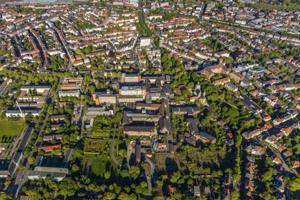 Aerial view, view of St Mauritz, Mauritzviertel, St Mauritz Catholic Church, Bau- und Liegenschaftsbetrieb North Rhine-Westphalia Münster, St Franziskus-Hospital, Mauritz School, Franciscan Sisters of St Mauritz, Münster, Münsterland, North Rhine-Westphalia, Germany. Mauritz, Münster, Münsterland, North Rhine-Westphalia, Germany, Alter Mauritzfriedhof, burial site, authority, DE, Europe, cemetery, memorial, healthcare, Gottesacker, graves, burial ground, hospital, clinic, clinic centre, hospital, aerial view, aerial photography, aerial photography, medical facility, medical aid, motherhouse garden, emergency service, park, resting place, overview, Münster administrative court, bird's eye view, birds-eyes view, overview, medical care