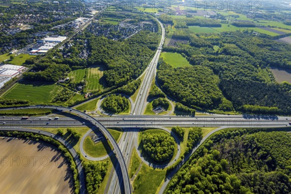 Aerial view, motorway junction Münster-Süd, motorway A1, motorway A43, Münster, Münsterland, North Rhine-Westphalia, Germany, motorway, motorway bridge, motorway junction, greening, DE, Europe, shapes and colours, freight traffic, landscape forms, aerial view, aerial photography, aerial photography, road traffic, overview, traffic, traffic volume, bird's-eye view, forest area, meadows and fields, birds-eyes view, overview
