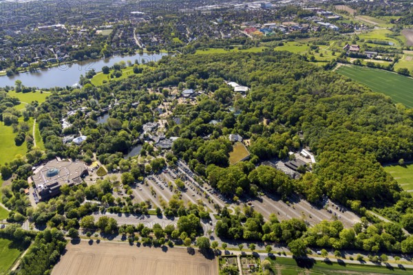 Aerial view, Allwetterzoo Münster, LWL-Museum für Naturkunde mit Planetarium, Münster, Münsterland, North Rhine-Westphalia, Germany, Aasee, DE, Europe, river Münstersche Aa, culture, art, aerial view, aerial photography, aerial photography, museum, Münstersche Aa, natural history museum, car parks, lake, reservoir, zoo, animal park, animal world, overview, bird's-eye view, forest area, zoo, Zoo Münster, birds-eyes view, cultural use, overview