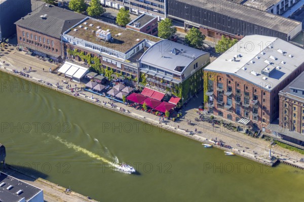 Aerial view, Münster city harbour, harbour promenade, harbour, Münster, Münsterland, North Rhine-Westphalia, Germany, outdoor gastronomy, boats, CaféMed, DE, Europe, leisure, leisure activities, leisure centre, gastronomy, commercial enterprises, commercial area, commercial location, commercial use, harbour basin, harbour area, harbour district, harbour overview, Harbourside, Hot Jazz Club, Klartext-Verlag, culture, art, Kunsthalle Münster, aerial view, aerial photography, aerial photography, motorboats, Münster from above, Münster book, trendy district, overview, bird's eye view, birds-eyes view, overview, corona distance. Corona distance, pandemic restrictions, end of lockdown