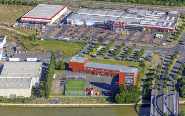 Aerial view, bathing at the canal, sunbathing lawn, fire station II, fire brigade at the Dortmund-Ems canal, Bauhaus DIY store, harbour, Münster, Münsterland, North Rhine-Westphalia, Germany, bathing in the canal, DIY store, fire fighter, fire protection, fire station, DE, shopping, Europe, fire station, fire brigade, Football pitch, Klartext-Verlag, aerial view, aerial photography, aerial photography, Münster from above, Münster book, rescue station, summer fun, sun worshippers, sunbathing, sport, sports facilities, sports field, sports facility, overview, bird's-eye view, overview, corona distance. Corona distance, pandemic restrictions, end of lockdown