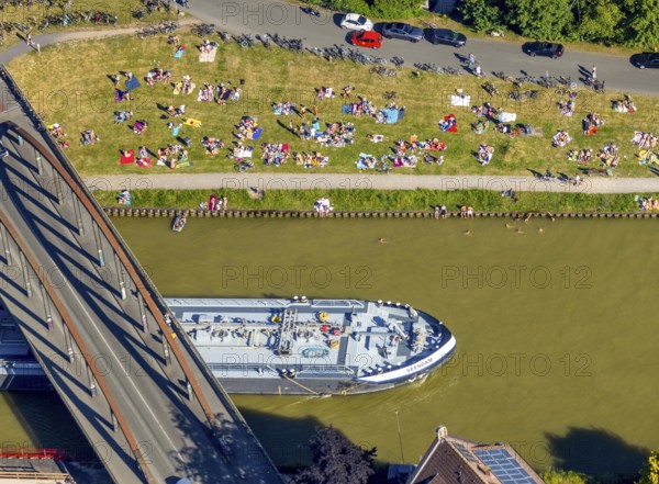 Aerial view, bathing at the canal, Dortmund-Ems canal, sunbathing lawn, sunbathing, August-Schepers-Straße, bridge Wolbecker Straße, Memelufer, Mauritz, Münster, Münsterland, North Rhine-Westphalia, Germany, bridge, DE, Europe, leisure, leisure pool, leisure activities, Klartext-Verlag, aerial view, aerial photography, aerial photography, Münster from above, Münster book, shipping traffic, summer fun, sun worshippers, lido, lido, overview, bird's eye view, birds-eyes view, free bathing establishment, overview, Corona distance. Corona distance, pandemic restrictions, end of lockdown, inland shipping, tanker, tanker cargo ship