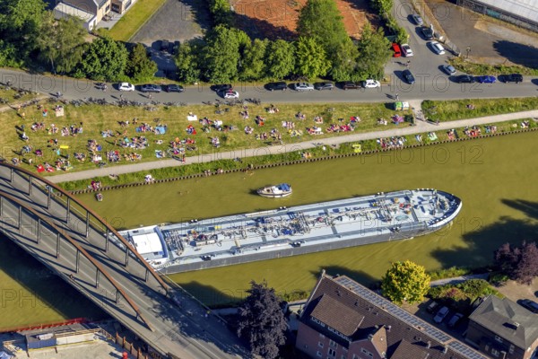 Aerial view, bathing at the canal, Dortmund-Ems canal, sunbathing lawn, sunbathing, August-Schepers-Straße, bridge Wolbecker Straße, Memelufer, Mauritz, Münster, Münsterland, North Rhine-Westphalia, Germany, bridge, DE, Europe, leisure, leisure pool, leisure activities, Klartext-Verlag, aerial view, aerial photography, aerial photography, Münster from above, Münster book, shipping traffic, summer fun, sun worshippers, lido, lido, overview, bird's eye view, birds-eyes view, free bathing establishment, overview, Corona distance. Corona distance, pandemic restrictions, end of lockdown, inland shipping, tanker, tanker cargo ship