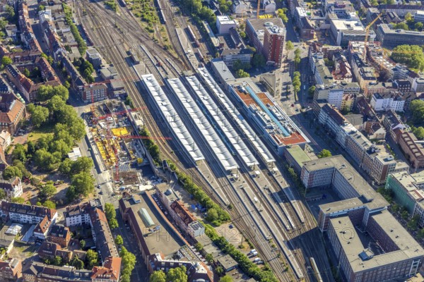 Aerial view, Münster main station, construction site residential and hotel complex, Mauritz, Münster, Münsterland, North Rhine-Westphalia, Germany, railway tracks, railway station, station forecourt, construction work, construction area, construction site, building plots, construction project, construction site, Bremer Platz, DE, Deutsche Bahn AG, Europe, main station, central station, Klartext-Verlag, aerial view, aerial photography, aerial photography, Münster from above, Münster book, new building, overview, bird's eye view, overview