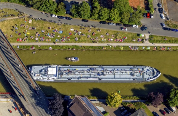 Aerial view, bathing at the canal, Dortmund-Ems canal, sunbathing lawn, sunbathing, August-Schepers-Straße, bridge Wolbecker Straße, Memelufer, Mauritz, Münster, Münsterland, North Rhine-Westphalia, Germany, bridge, DE, Europe, leisure, leisure pool, leisure activities, Klartext-Verlag, aerial view, aerial photography, aerial photography, Münster from above, Münster book, shipping traffic, summer fun, sun worshippers, lido, lido, overview, bird's eye view, birds-eyes view, free bathing establishment, overview, Corona distance. Corona distance, pandemic restrictions, end of lockdown, inland shipping, tanker, tanker cargo ship