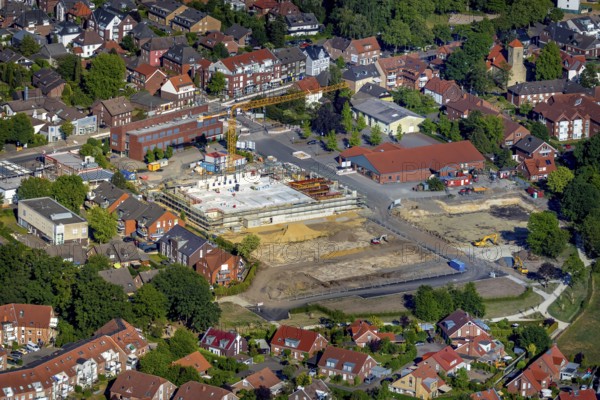 Aerial view, construction site new building flats on the site of the former nursery, catholic Alt St. Clemens Church, Hiltrup, Münster, Münsterland, North Rhine-Westphalia, Germany, place of worship, construction work, construction area, building site, building plots, construction project, construction site, DE, shopping centre, Europe, religious community, place of worship, church, parish, Klartext-Verlag, denomination, Lidl, aerial view, aerial photography, aerial photography, Münster from above, Münster book, new building, religion, overview, bird's eye view, birds-eyes view, overview