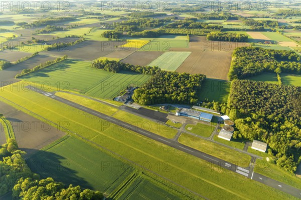 Aerial photo, Münster-Telgte airfield, Telgte, Warendorf district, Münsterland, North Rhine-Westphalia, Germany, DE, Europe, distant view, airport, FunFlight flight school, runway, aerial photo, aerial photography, aerial photography, runway, overview, bird's-eye view, woodland, meadows and fields, birds-eyes view, overview
