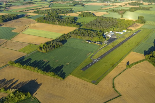 Aerial photo, Münster-Telgte airfield, Telgte, Warendorf district, Münsterland, North Rhine-Westphalia, Germany, DE, Europe, distant view, airport, FunFlight flight school, runway, aerial photo, aerial photography, aerial photography, runway, overview, bird's-eye view, woodland, meadows and fields, birds-eyes view, overview