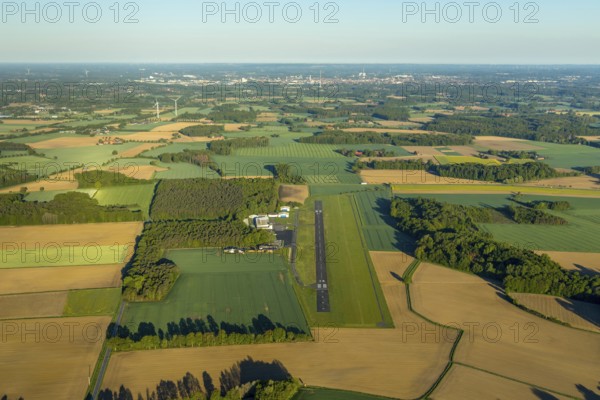 Aerial photo, Münster-Telgte airfield, Telgte, Warendorf district, Münsterland, North Rhine-Westphalia, Germany, DE, Europe, distant view, airport, FunFlight flight school, runway, aerial photo, aerial photography, aerial photography, runway, overview, bird's-eye view, woodland, meadows and fields, birds-eyes view, overview