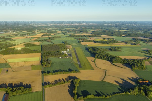 Aerial photo, Münster-Telgte airfield, Telgte, Warendorf district, Münsterland, North Rhine-Westphalia, Germany, DE, Europe, distant view, airport, FunFlight flight school, runway, aerial photo, aerial photography, aerial photography, runway, overview, bird's-eye view, woodland, meadows and fields, birds-eyes view, overview