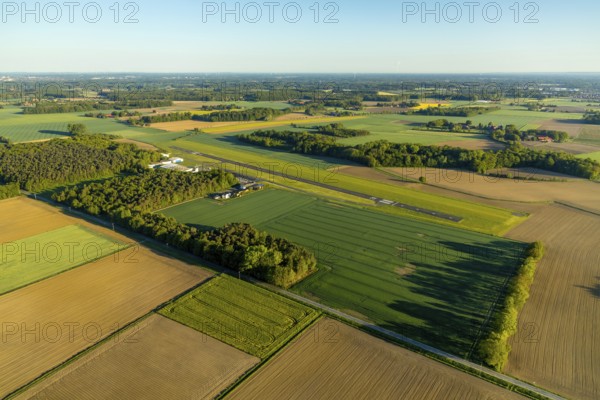 Aerial photo, Münster-Telgte airfield, Telgte, Warendorf district, Münsterland, North Rhine-Westphalia, Germany, DE, Europe, distant view, airport, FunFlight flight school, runway, aerial photo, aerial photography, aerial photography, runway, overview, bird's-eye view, woodland, meadows and fields, birds-eyes view, overview