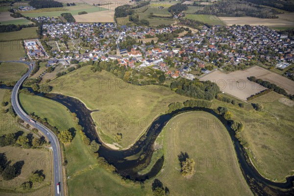 Aerial view, river Lippe, Lippe meadows, nature reserve, bridge Heintroper Straße over the Lippe, view of Lippborg, Lippetal, district Soest, North Rhine-Westphalia, Germany, place of worship, federal road B475, DE, Europe, religious community, place of worship, main street, church, parish, denomination, Kreis-Soest-Buch, KreisSoestBuch, aerial photography, aerial photography, NSG, nature conservation, religion, overview, environmental protection, bird's-eye view, meadows and fields, meadows and pastures, birds-eyes view, catholic church of St. Cornelius and St. Cyprelius, church of St. Cyprelius and St. Cyprelius Church of St Cornelius and Cyprian, national nature reserve, overview, Lippe meander, meandering river, meander