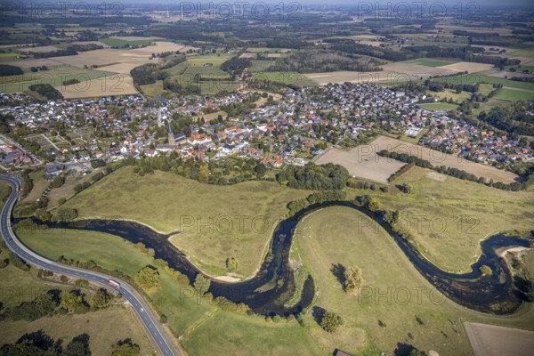 Aerial view, river Lippe, Lippe meadows, nature reserve, bridge Heintroper Straße over the Lippe, view of Lippborg, Lippetal, district Soest, North Rhine-Westphalia, Germany, place of worship, federal road B475, DE, Europe, religious community, place of worship, main street, church, parish, denomination, Kreis-Soest-Buch, KreisSoestBuch, aerial photography, aerial photography, NSG, nature conservation, religion, overview, environmental protection, bird's-eye view, meadows and fields, meadows and pastures, birds-eyes view, catholic church of St. Cornelius and St. Cyprelius, church of St. Cyprelius and St. Cyprelius Church of St Cornelius and Cyprian, national nature reserve, overview