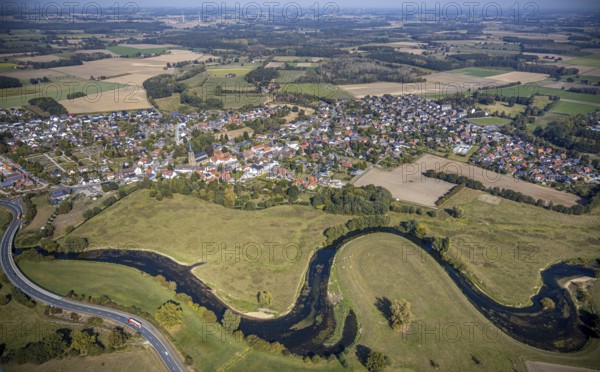 Aerial view, river Lippe, Lippe meadows, nature reserve, bridge Heintroper Straße over the Lippe, view of Lippborg, Lippetal, district Soest, North Rhine-Westphalia, Germany, place of worship, federal road B475, DE, Europe, religious community, place of worship, main street, church, parish, denomination, Kreis-Soest-Buch, KreisSoestBuch, aerial photography, aerial photography, NSG, nature conservation, religion, overview, environmental protection, bird's-eye view, meadows and fields, meadows and pastures, birds-eyes view, catholic church of St. Cornelius and St. Cyprelius, church of St. Cyprelius and St. Cyprelius Church of St Cornelius and Cyprian, national nature reserve, overview