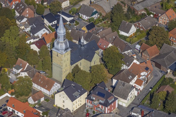 Aerial view, town view, St. Stephanus Kirche, Oestinghausen, Lippetal, Kreis Soest, North Rhine-Westphalia, Germany, place of worship, DE, Europe, religious community, place of worship, property tax, real estate, city centre, church, parish, denomination, Kreis-Soest-Buch, KreisSoestBuch, aerial view, aerial photography, aerial photography, religion, city centre, overview, bird's-eye view, residential area, living and life, residential area, residential buildings, quality of life, residential quarter, housing estate, birds-eyes view, overview