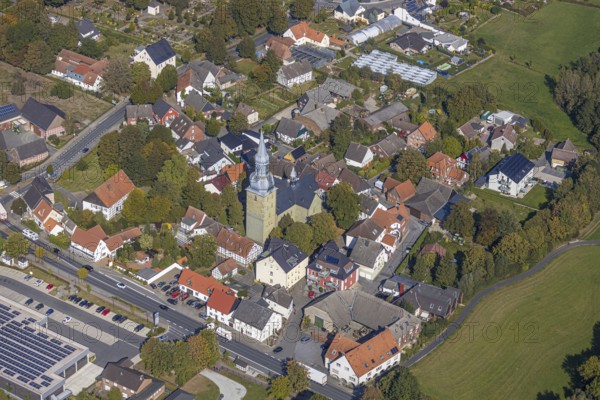 Aerial view, town view, St. Stephanus Kirche, Oestinghausen, Lippetal, Kreis Soest, North Rhine-Westphalia, Germany, place of worship, DE, Europe, religious community, place of worship, property tax, real estate, city centre, church, parish, denomination, Kreis-Soest-Buch, KreisSoestBuch, aerial view, aerial photography, aerial photography, religion, city centre, overview, bird's-eye view, residential area, living and life, residential area, residential buildings, quality of life, residential quarter, housing estate, birds-eyes view, overview