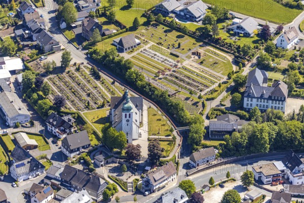 Aerial view, catholic church St. Jakobus der Ältere, cemetery Elspe, Elspe, Lennestadt, Sauerland, North Rhine-Westphalia, Germany, place of worship, burial place, education, educational institution, DE, Europe, cemetery, memorial, religious community, place of worship, primary schools, graves, burial ground, church, parish, denomination, teaching institute, aerial photograph, aerial photography, aerial photography, resting place, school, overview, bird's eye view, birds-eyes view, overview