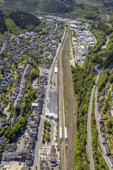 Aerial view, Lennestadt-Altenhundem railway station, Hundem Lenne Center, commercial area railway depot, Altenhundem, Lennestadt, Sauerland, North Rhine-Westphalia, Germany, railway tracks, railway station, station forecourt, DE, Deutsche Bahn AG, Europe, commercial enterprises, commercial area, commercial area, commercial location, commercial use, industrial area, industrial location, aerial view, aerial photography, aerial photography, overview, bird's eye view, birds-eyes view, overview