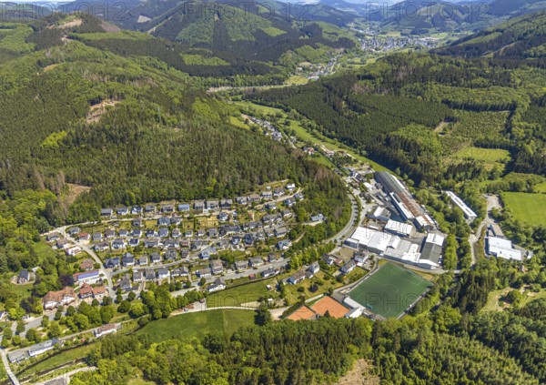 Aerial view, Langenei sports field, Fredeburger Straße commercial area, Langenei town view, Lennestadt, Sauerland, North Rhine-Westphalia, Germany, DE, Europe, Fredeburger Straße, football pitch, football stadium, property tax, hilly landscape, real estate, aerial view, aerial photography, aerial photography, sports, sports facilities, sports field, sports facility, tennis, tennis facility, tennis courts, overview, bird's-eye view, forest area, residential area, housing and living, residential area, residential buildings, housing estate, birds-eyes view, overview