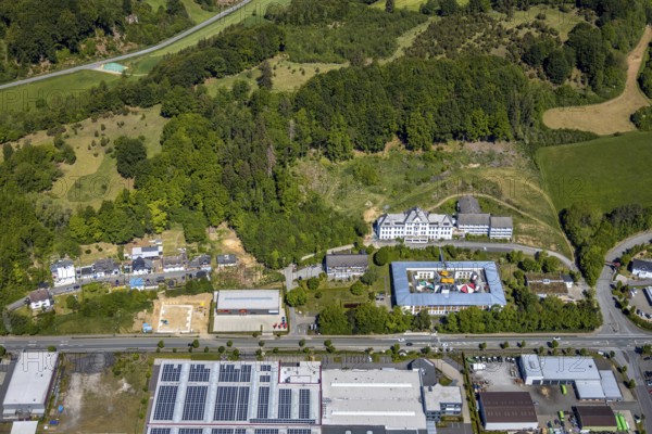 Aerial view, Caritas retirement home and nursing home St. Franziskus-Haus, ABEX SCHEDLER HAUSTECHNIK construction site new building, Trockenbrück, Lennestadt, Sauerland, North Rhine-Westphalia, Germany, demolition, retirement home, retirement home, care and nursing, Bielefelder Straße, DE, Europe, aerial view, aerial photography, aerial photography, care facility, retirement home, retirement residence, retirement home, senior citizens' centre, overview, bird's eye view, birds-eyes view, overview, dilapidated, destroyed building
