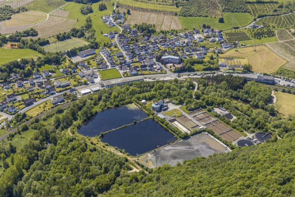 Aerial view, waterworks Maumke, company building Innofactory GmbH, Maumker Straße, Lennestadt, Sauerland, North Rhine-Westphalia, Germany, DE, Europe, football pitch, commercial enterprises, commercial area, commercial location, commercial use, property tax, real estate, aerial photograph, aerial photography, aerial photography, sports field SV Maumke, overview, bird's eye view, residential complex, living and life, residential area, residential buildings, housing estate, birds-eyes view, overview