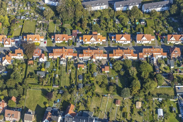 Aerial view, Ebertstraße housing estate, Lippstadt, Soest district, North Rhine-Westphalia, Germany, DE, single-family homes, Europe, gardens, property tax, green trees, real estate, Soest-Buch district, Soest-Buch district, aerial photography, aerial photography, aerial view, terraced houses, overview, bird's-eye view, housing estate, living and living, residential area, residential buildings, quality of living, residential neighbourhood, housing estate, birds-eyes view, overview, red roofs