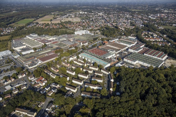 Aerial view, Beckumer Straße industrial estate, thyssenkrupp rothe erde Germany, Hella GmbH, Lippstadt, Soest district, North Rhine-Westphalia, Germany, DE, Europe, distant view, Gausmann's Weg, commercial enterprises, commercial area, industrial estate, industrial park, commercial location, commercial use, industrial area, industrial building, industrial location, Kreis-Soest-Buch, KreisSoestBuch, aerial view, aerial photography, aerial photography, terraced houses Am Rüsing, overview, bird's-eye view, birds-eyes view, overview