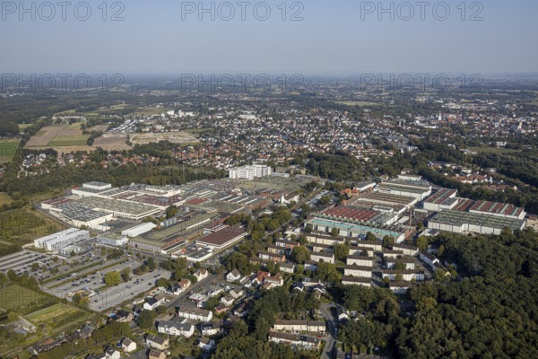 Aerial view, Beckumer Straße industrial estate, thyssenkrupp rothe erde Germany, Hella GmbH, Lippstadt, Soest district, North Rhine-Westphalia, Germany, DE, Europe, distant view, Gausmann's Weg, commercial enterprises, commercial area, industrial estate, industrial park, commercial location, commercial use, industrial area, industrial building, industrial location, Kreis-Soest-Buch, KreisSoestBuch, aerial view, aerial photography, aerial photography, terraced houses Am Rüsing, overview, bird's-eye view, birds-eyes view, overview