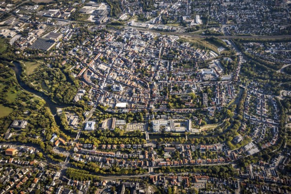 Aerial view, Old Town overview, Evangelical Great St Mary's Church, Rathausstraße, Jakobikirche, Lange Straße, River Lippe, Lippstadt, Soest district, North Rhine-Westphalia, Germany, Old Town view, Old Town ring road, Place of worship, Education, Educational institution, Cappeltor, City, DE, Damenstift Lippstadt, Monument protection, Dreifaltigkeits-Hospital gem. GmbH Lippstadt, Europe, Europaschule Ostendorf-Gymnasium, healthcare, religious community, place of worship, property tax, green trees, grammar school, holy site, hospital, Im Stift, real estate, city centre, canoe route Burgstraße, church, parish, Kleine Marienkirche, clinic, clinic centre, denomination, hospital, Kreis-Soest-Buch, KreisSoestBuch, culture, art, educational institute, aerial view, aerial photography, aerial photography, medical facility, medical aid, emergency service, town hall, town hall square, religion, religious site, ruin, play, school, city view, Lippstadt municipal theatre, town centre, St. Marien, Ab...