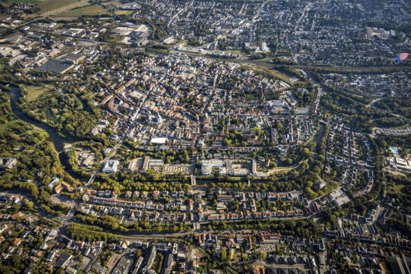 Aerial view, Old Town overview, Evangelical Great St Mary's Church, Rathausstraße, Jakobikirche, Lange Straße, River Lippe, Lippstadt, Soest district, North Rhine-Westphalia, Germany, Old Town view, Old Town ring road, Place of worship, Education, Educational institution, Cappeltor, City, DE, Damenstift Lippstadt, Monument protection, Dreifaltigkeits-Hospital gem. GmbH Lippstadt, Europe, Europaschule Ostendorf-Gymnasium, healthcare, religious community, place of worship, property tax, green trees, grammar school, holy site, hospital, Im Stift, real estate, city centre, canoe route Burgstraße, church, parish, Kleine Marienkirche, clinic, clinic centre, denomination, hospital, Kreis-Soest-Buch, KreisSoestBuch, culture, art, educational institute, aerial view, aerial photography, aerial photography, medical facility, medical aid, emergency service, town hall, town hall square, religion, religious site, ruin, play, school, city view, Lippstadt municipal theatre, town centre, St. Marien, Ab...