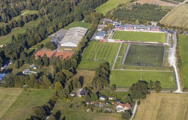 Aerial view, sports facility, stadium SV Lippstadt 08, Liebelt-Arena, football player training, Lippstadt, district Soest, North Rhine-Westphalia, Germany, arena, DE, Europe, football pitch, football stadium, football club, district Soest-Buch, district Soest-Buch, aerial view, aerial photography, aerial photography, shadow, sports, sports facilities, sports field, sports facility, stadium, stadium Am Bruchbaum, overview, bird's-eye view, Wiedenbrücker Straße, birds-eyes view, overview