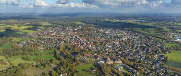 Aerial view, town view, town hall Schermbeck, Weseler Straße, Schermbeck, Ruhr area, North Rhine-Westphalia, Germany, old town, place of worship, authority, DE, Europe, distant view, religious community, place of worship, property tax, holy place, real estate, church, parish, denomination, aerial view, aerial photography, aerial photography, town hall, religion, religious site, townscape, city area, city administration, city centre, overview, bird's-eye view, residential area, living and life, residential area, residential buildings, quality of life, residential area, housing estate, birds-eyes view, former Reformed Church, evang. Georgskirche Schermbeck, catholic St. Ludgerus church, overview