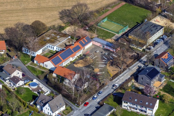 Aerial view, Hellweg primary school, Ampen, Soest, Soester Börde, North Rhine-Westphalia, Germany, Am Hellweg, education, educational institution, DE, Europe, primary school, teaching institute, aerial view, aerial photography, aerial photography, mini playing field football pitch, photovoltaic, photovoltaic system, school, solar, solar system, solar energy, solar energy, overview, bird's-eye view, birds-eyes view, overview