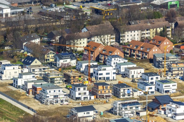 Aerial view, construction area Belgian Quarter, new residential area, Soest, Soester Börde, North Rhine-Westphalia, Germany, construction work, construction area, construction site, building plots, construction crane, construction measure, construction project, construction site, DE, development, Europe, property tax, real estate, capacity requirement, aerial photograph, aerial photography, aerial photography, Meiningser Weg, new construction, overview, bird's eye view, residential complex, living and living, residential area, residential buildings, birds-eyes view, former ADAM barracks, overview
