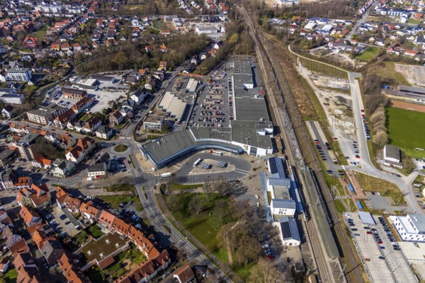 Aerial view, Soest railway station, City Center shopping centre, Am Bahnhof, Soest, Soester Börde, North Rhine-Westphalia, Germany, railway station, bus station, DE, Deutsche Bahn AG, shopping square, shopping centre, Europe, aerial view, aerial photography, aerial photography, local supply centre, S-Bahn, overview, bird's-eye view, overview