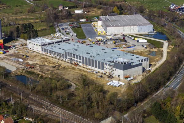 Aerial view, industrial estate northwest, construction site new building logistics hall Kuchenmeister GmbH, old sugar factory site, Hammer Landstraße, Soest, Soester Börde, North Rhine-Westphalia, Germany, construction work, construction vehicles, construction area, construction site, building plots, construction measure, construction project, construction site, DE, Europe, commercial enterprises, commercial area, commercial area, commercial location, commercial use, industrial area, industrial location, capacity requirement, cake bakery, aerial view, aerial photography, aerial photography, new building, overview, bird's-eye view, birds-eyes view, overview