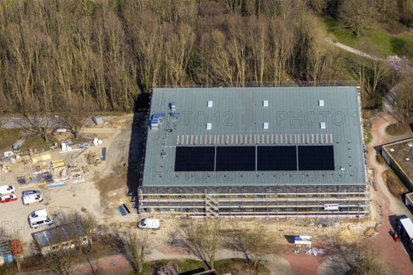 Aerial view, construction site, new sports hall at Börde-Berufskolleg, Soest, Soester Börde, North Rhine-Westphalia, Germany, construction work, construction area, building site, building plots, construction project, construction site, DE, Europe, capacity requirements, aerial photograph, aerial photography, aerial photography, new building, sports hall, overview, bird's-eye view, bird's-eye view, overview
