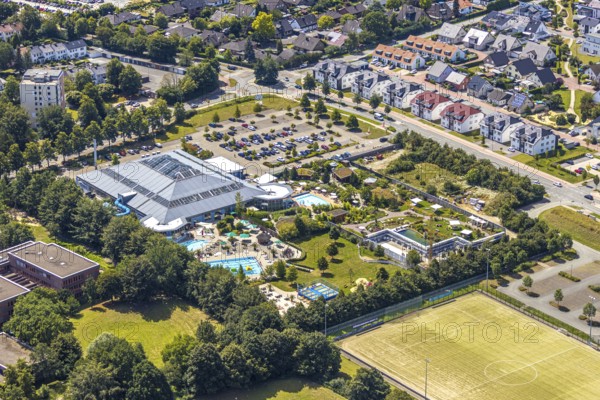 Aerial view, adventure pool, Aqua Spa and Aqua Fun Soest, outdoor pool, bathers, Soest, Soester Börde, North Rhine-Westphalia, Germany, DE, Europe, birds-eyes view, aerial view, aerial photography, aerial photography, overview, overview, bird's eye view, corona distance, keeping distance, swimming pool with Suan, sauna park, swimming pool, swimmer, blue water, sunbathing lawn, parasols