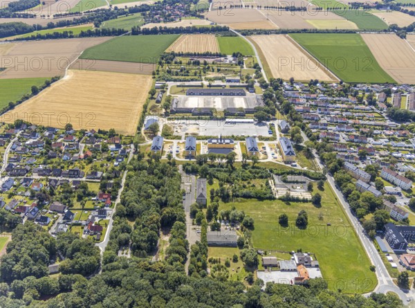 Aerial view, former Kanaal van Wessem barracks, military chapel being restored, Hiddinser Weg, planned refugee camp, Soest, Soester Börde, North Rhine-Westphalia, Germany, DE, Europe, birds-eyes view, aerial view, aerial photography, aerial photography, overview, bird's eye view