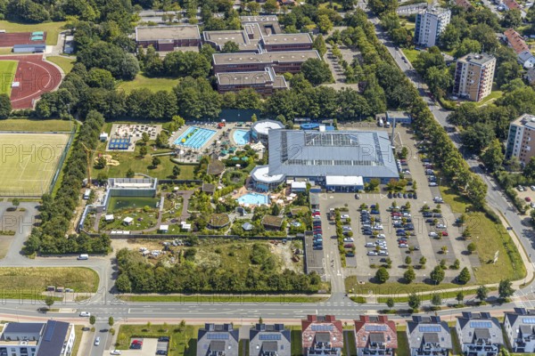 Aerial view, adventure pool, Aqua Spa and Aqua Fun Soest, outdoor pool, bathers, Soest, Soester Börde, North Rhine-Westphalia, Germany, DE, Europe, birds-eyes view, aerial view, aerial photography, aerial photography, overview, overview, bird's eye view, corona distance, keeping distance, swimming pool with Suan, sauna park, swimming pool, swimmer, blue water, sunbathing lawn, parasols